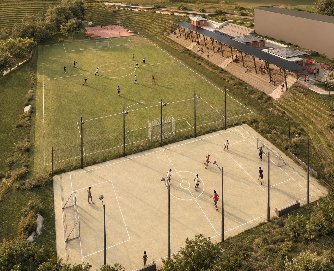 Full-size soccer field, futsal court and multi-purpose courts stepping down the terraced site.
